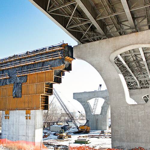 construction happening on a concrete bridge